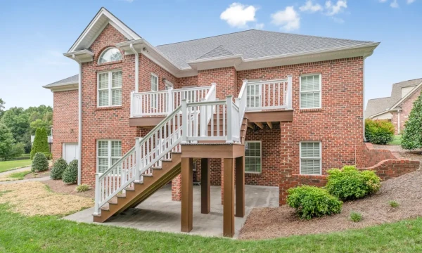 brick house with composite decking