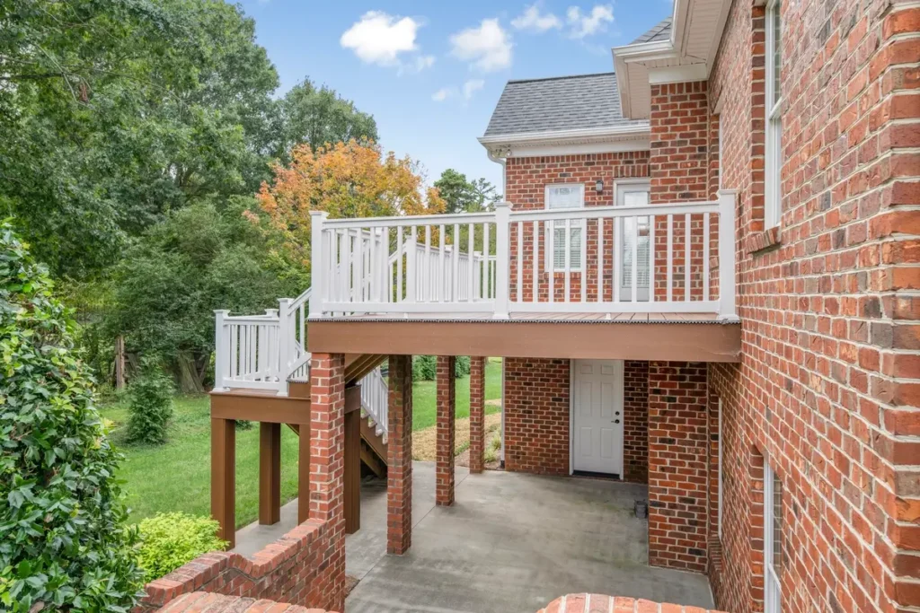 Side view of Turnstone Court composite deck showing supports and shaded concrete area below