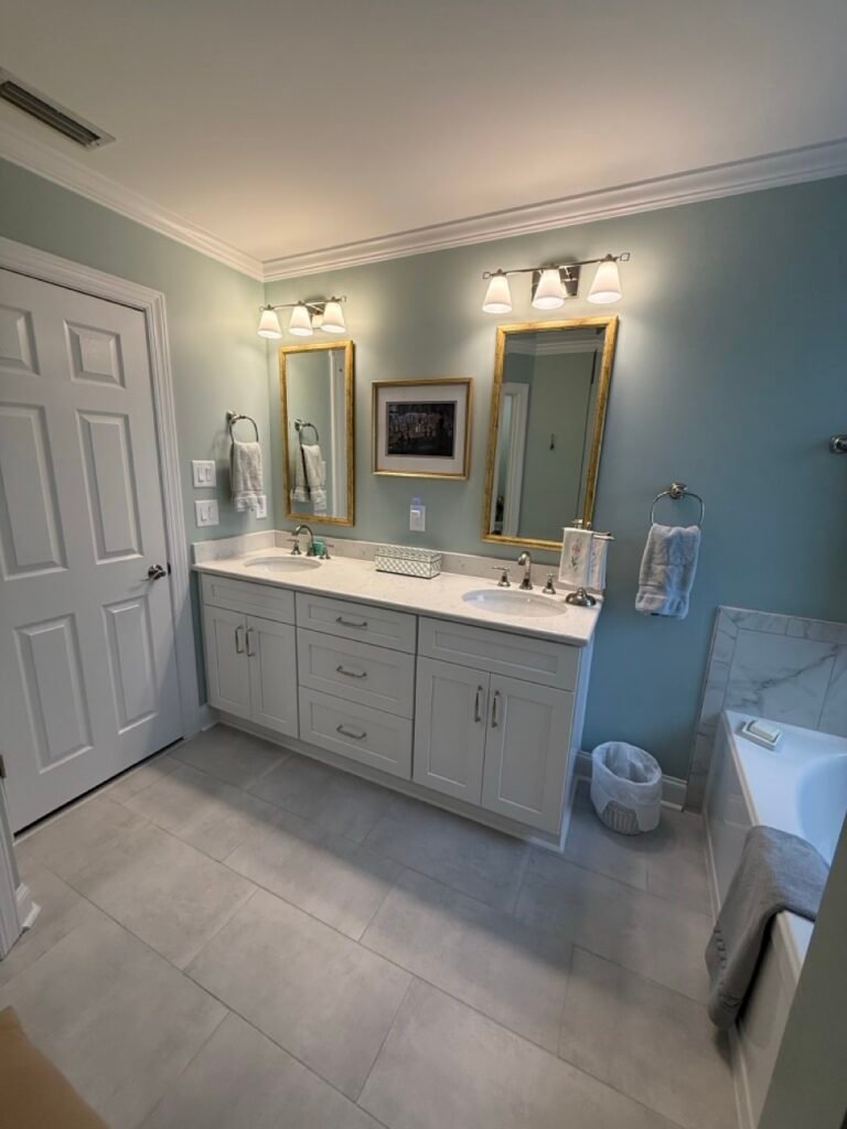 Meadowlark Glen Lane remodel double vanity with quartz counter and framed mirrors