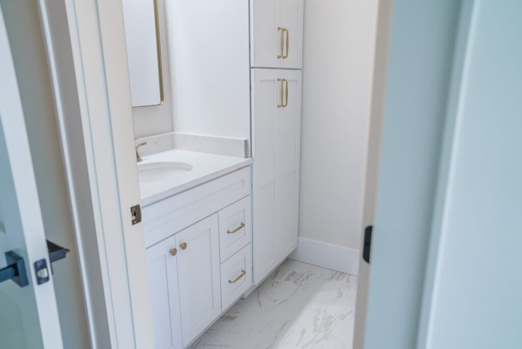 Bathroom in the Jack Davis custom home with tile and marble finishes