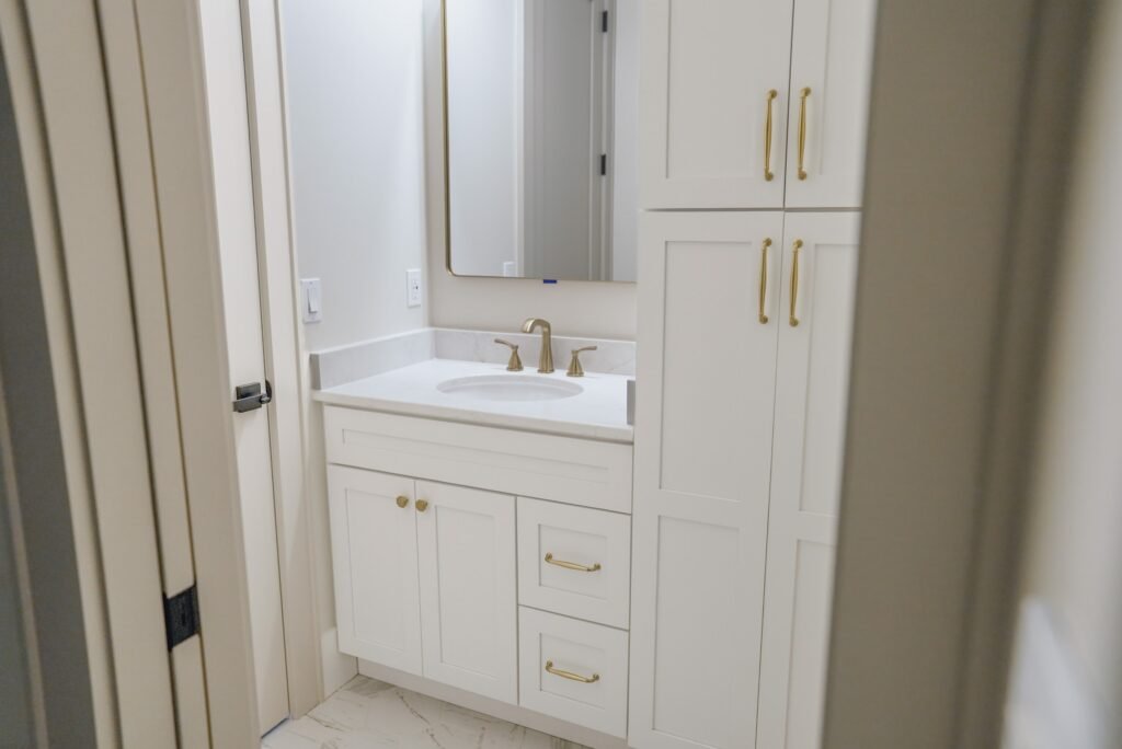 Bathroom in the Jack Davis custom home with tile and marble finishes