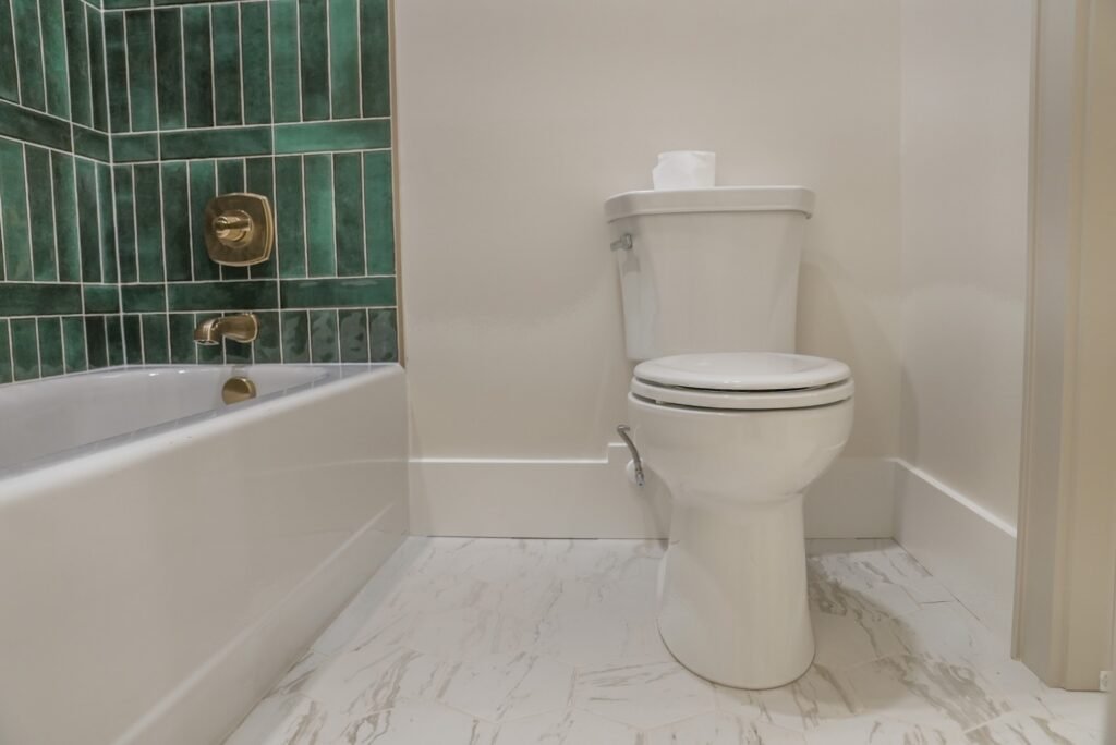 Bathroom in the Jack Davis custom home with tile and marble finishes