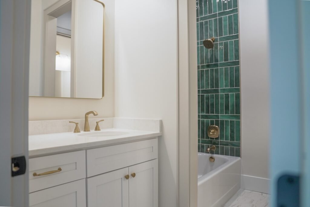 Bathroom in the Jack Davis custom home with tile and marble finishes