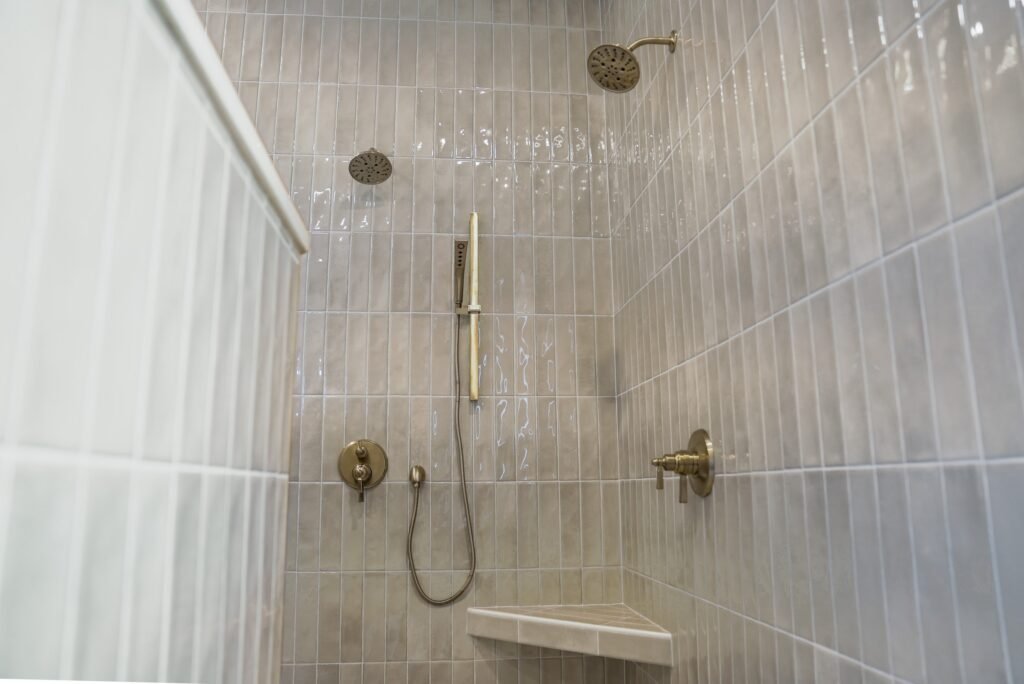 Bathroom in the Jack Davis custom home with tile and marble finishes