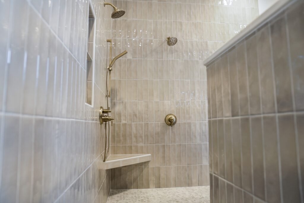 Bathroom in the Jack Davis custom home with tile and marble finishes