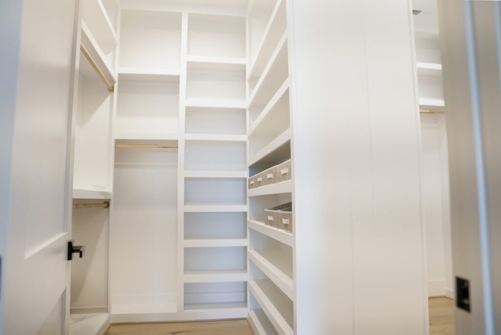 Custom closet with built-in shelving in the Jack Davis home