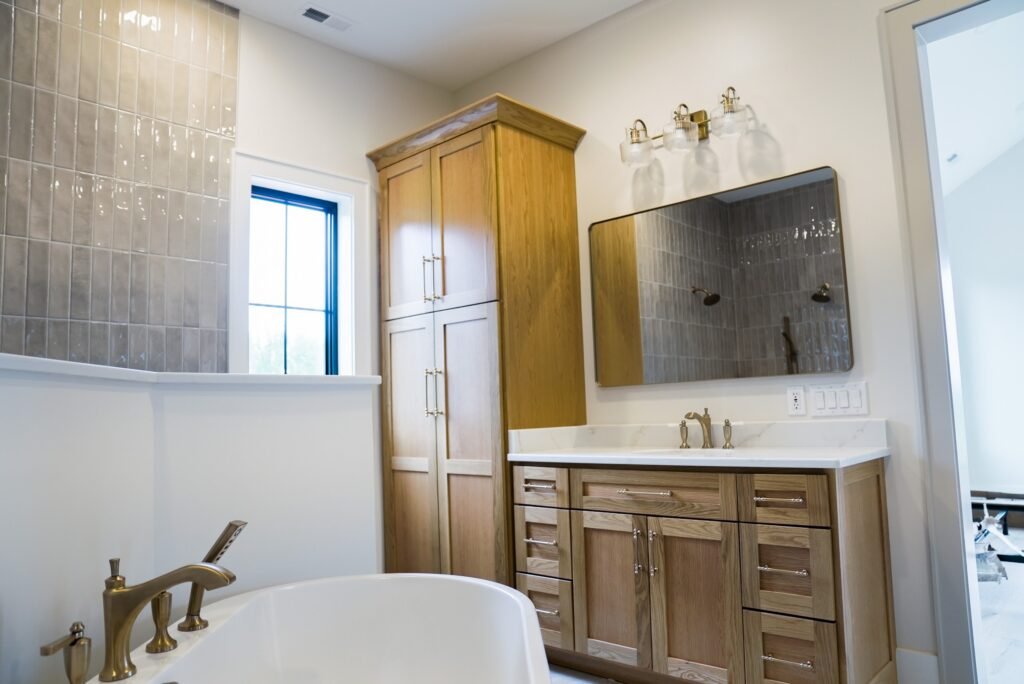 Bathroom in the Jack Davis custom home with tile and marble finishes