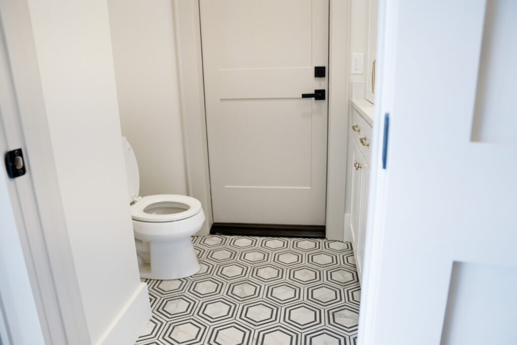 Bathroom in the Jack Davis custom home with tile and marble finishes