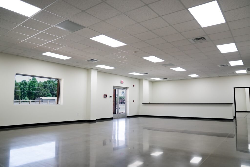 Open showroom with white walls and large windows